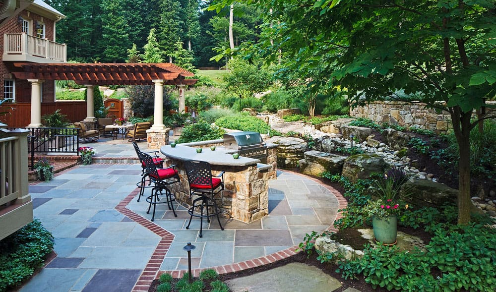 outdoor kitchen on flagstone patio