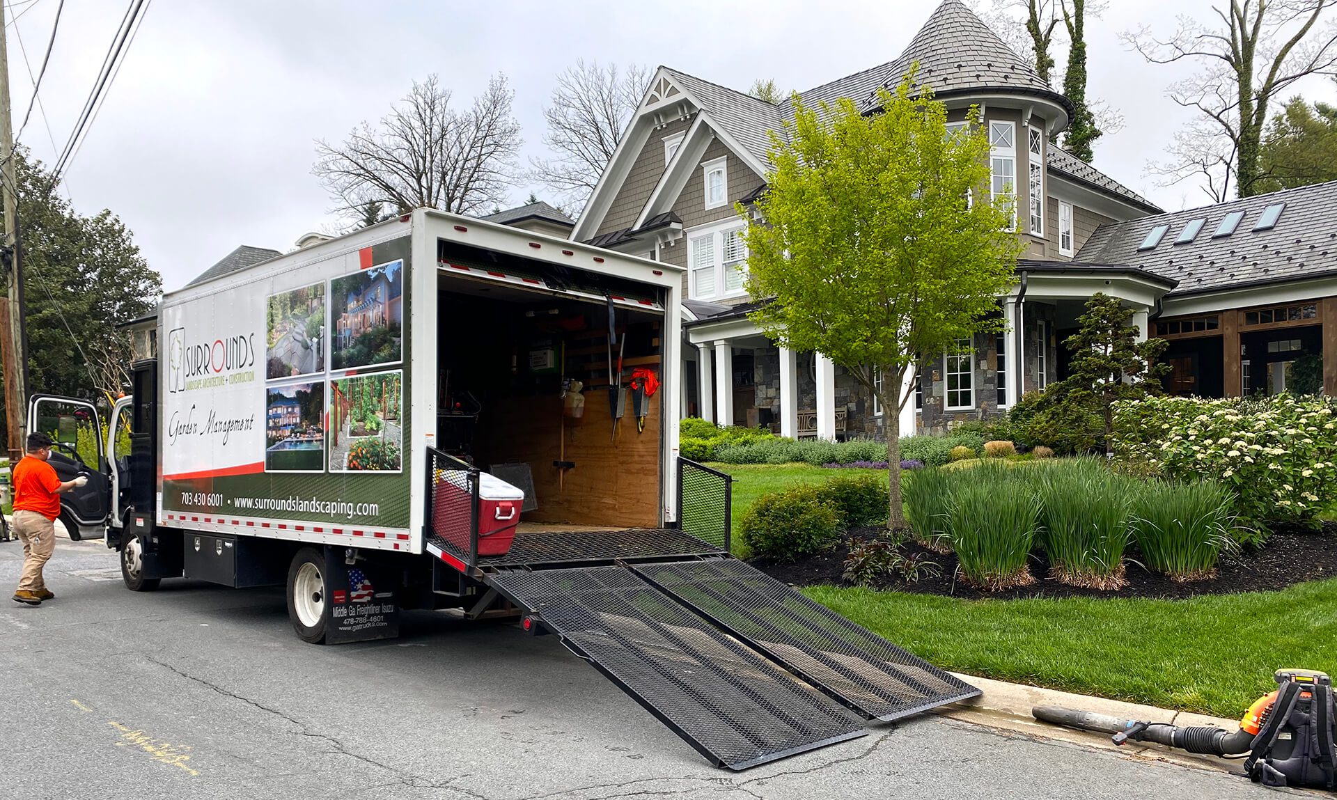 truck unloading lawn care and garden services equipment