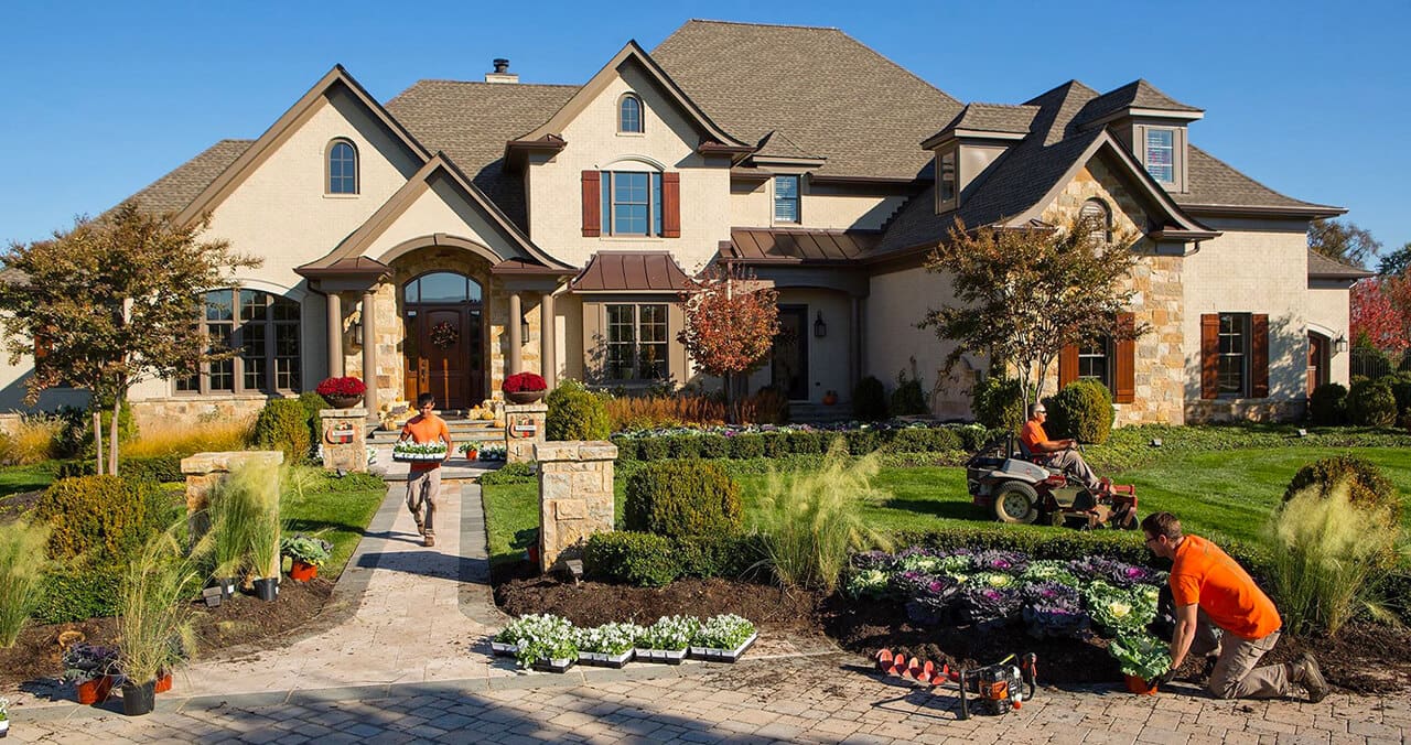 landscapers implementing fine gardening